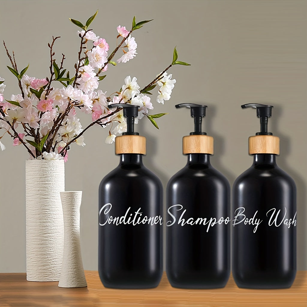 3 black soap dispensers for bathroom shower products, refillable liquid storage containers.