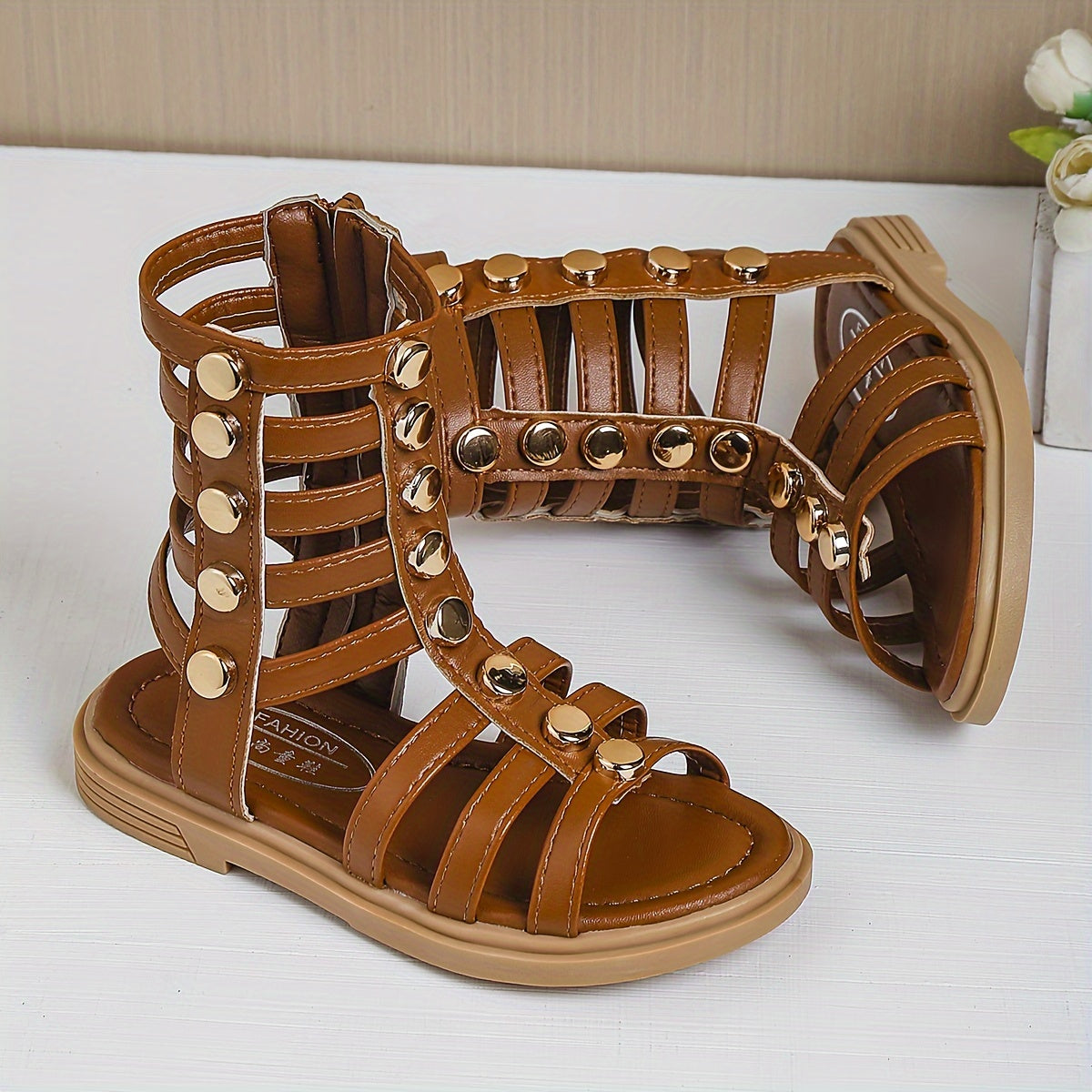 1 Pair of Fashion Rivet Buckle Sandals with Geometric Pattern, Back Zipper, Synthetic Faux Leather Upper and Rubber Sole for Spring/Summer Wear.