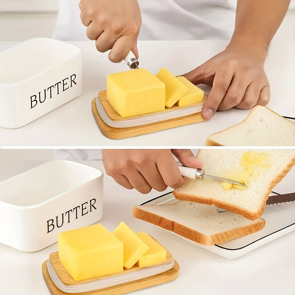 A complete set including a butter dish with a bamboo lid and butter knife, this large ceramic butter box is perfect for kitchen baking and gifting. It serves as an airtight butter keeper container for countertop or refrigerator storage. Ideal for home