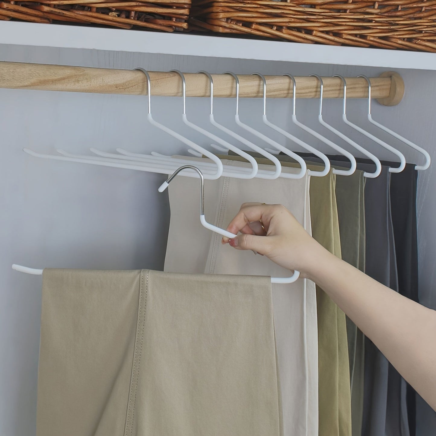 White open-ended pants hangers