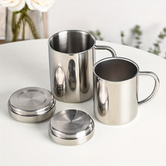 Stainless steel coffee mug with lid, double-wall insulation, versatile drinkware, ideal gift.