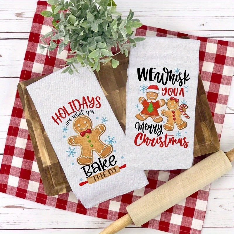 Get in the holiday spirit with this 2-piece set of kitchen towels, each measuring 18 by 66.04 cm. Embellished with charming Christmas themes, these towels are perfect for family gatherings and festive decorations. Add a touch of holiday charm to your