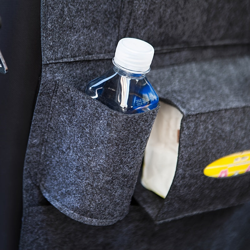 Multi-functional car seat back hanging storage bag for car interior.