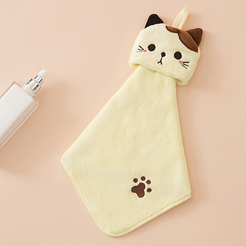 Soft coral fleece hand towel embroidered with a cat design - cute and absorbent for kitchen and bathroom use.