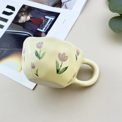 Ceramic mug with flowers pattern, irregular shape, Korean style, suitable for coffee, milk, tea, oatmeal, and breakfast.