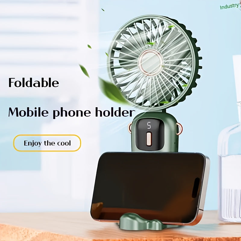 Sleek and stylish white and rose gold Compact & Portable USB Rechargeable Mini Fan with Neck Strap. Perfect for use in the office, classroom, or while traveling. Features a 1200mAh Lithium Battery, desk stand, and includes a power cable for convenient