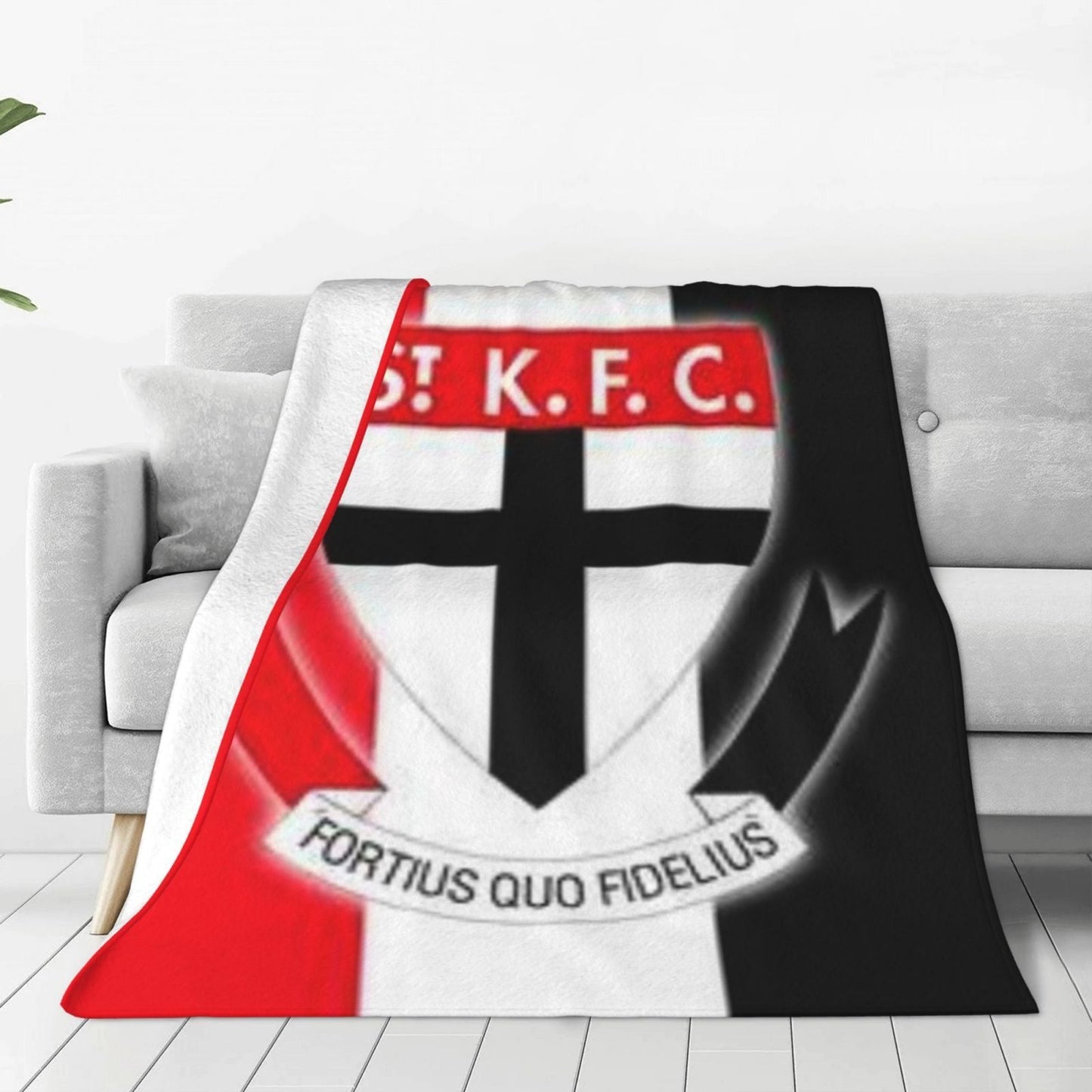 Stay warm and cozy with the St Kilda Australian Rules Football Club Printed Fleece Blanket. This soft and snug throw blanket is ideal for napping, whether on the sofa, in the office, on the bed, or while camping or traveling. It makes a versatile gift