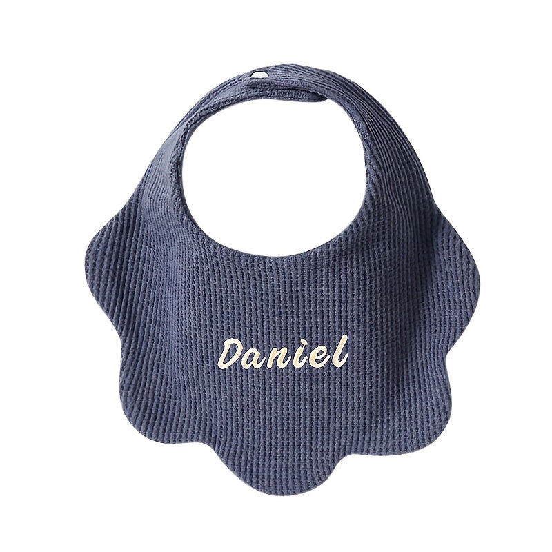 Customize your baby's style with our Personalized Drool Bibs. These bibs feature custom embroidery, an adjustable snap closure, and soft absorbent knit fabric. They make the perfect gift for a baby shower or holiday. Suitable for babies aged 0-3 years