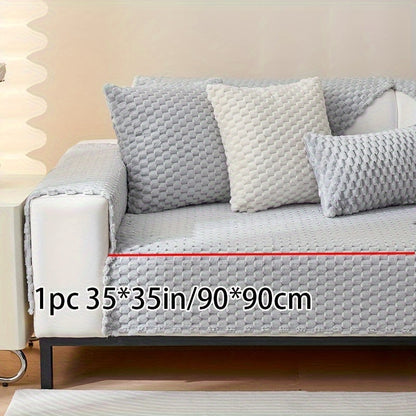 Non-slip sofa cover with honeycomb pattern, ideal for all seasons and protecting furniture in any room.