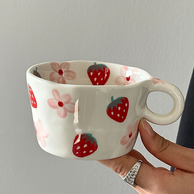 Unique hand-painted ceramic mug with a charming strawberry and floral design, perfect for coffee or tea. Ideal Valentine's Day gift, reusable and high-quality, featuring an irregular art style.