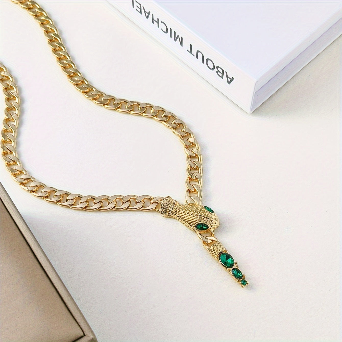 Add a touch of elegance with our stunning snake pendant necklace, adorned with shimmering rhinestones. Made from luxurious zinc alloy, this clavicle chain is perfect for women who want to stand out at parties or give a thoughtful gift.