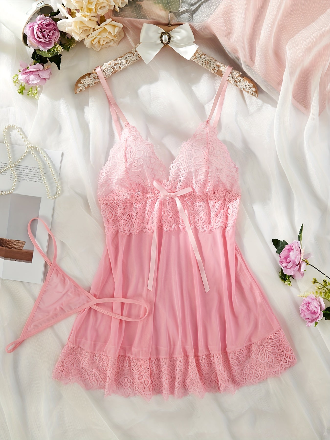 Pink lace nightgown set with satin bow detail, adjustable straps, and sheer boudoir vibe.