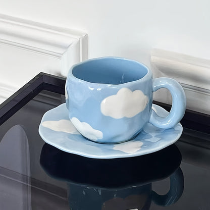 Cloud-shaped ceramic coffee mug with saucer - reusable, handwash only, ideal for breakfast & office use - great gift idea.