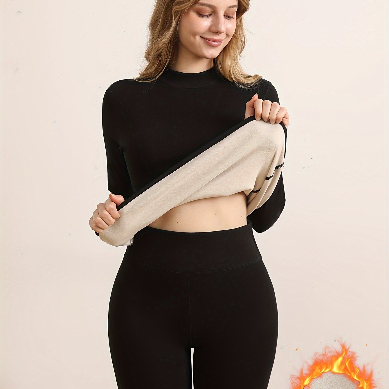 Women's thermal underwear set: Winter plush lined top and pants with high neck and long sleeves.