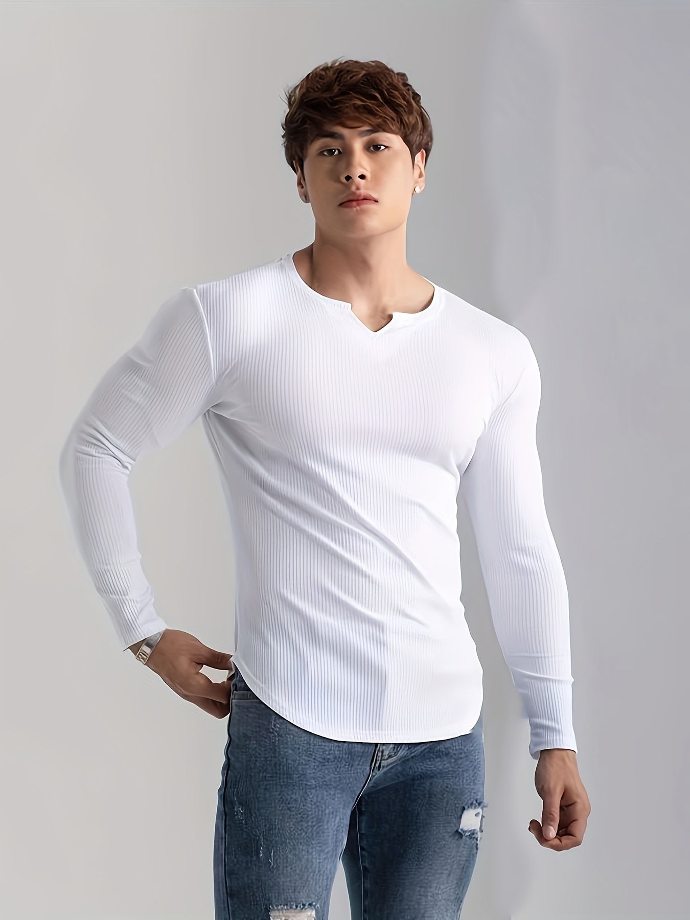 Men's solid color long sleeve V-neck t-shirt for comfortable and casual wear in spring and fall outdoor activities.