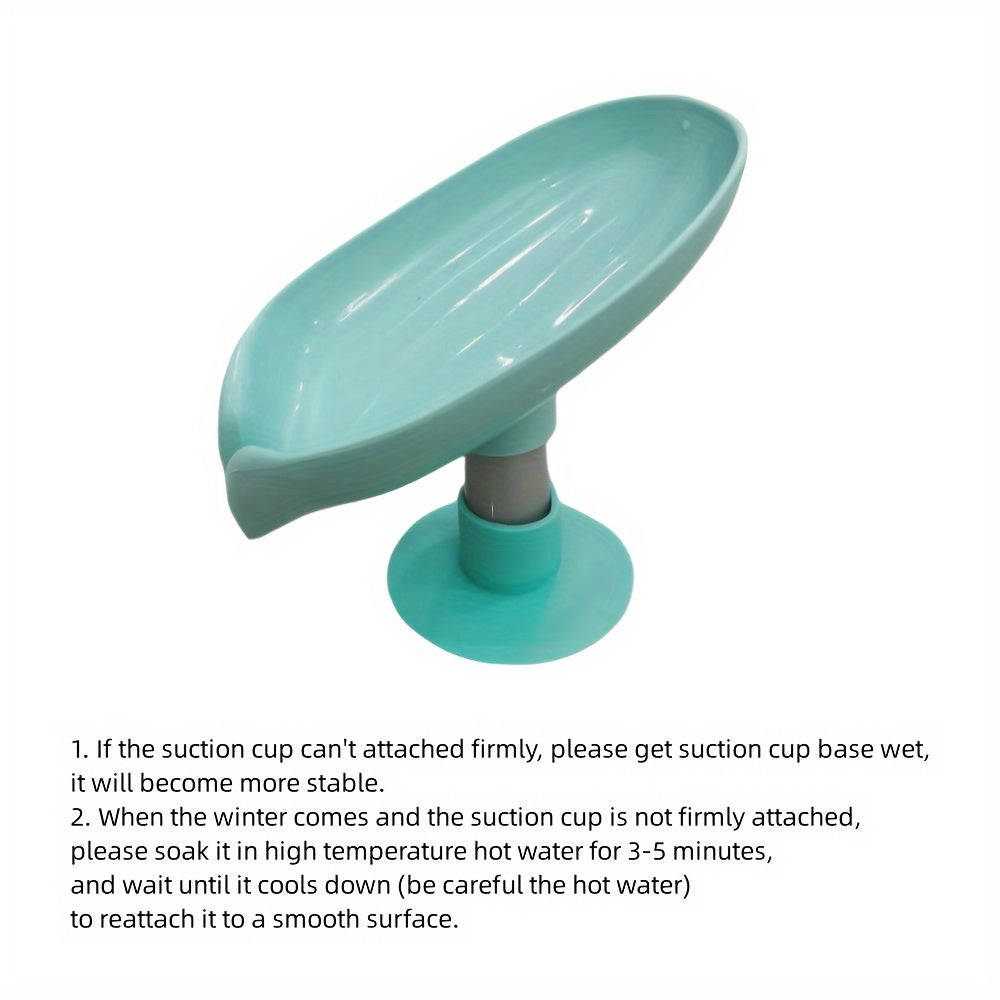 Plastic oval soap dish with suction cup design for home use.