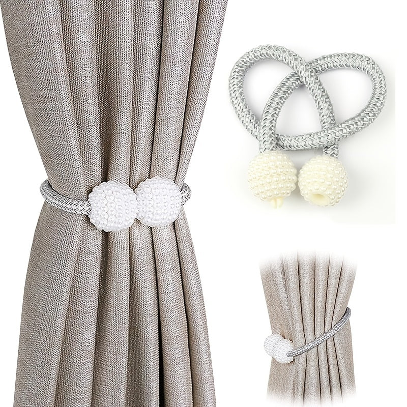 A set of magnetic curtain ties for securing curtain ropes, ideal for family home or office decor.