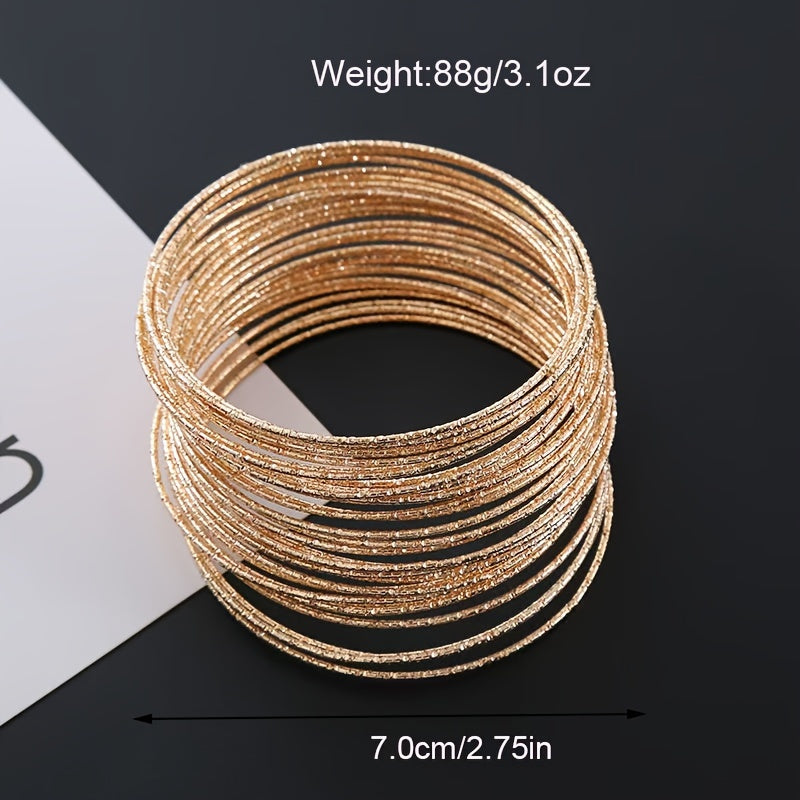 A collection of 30/50 fashionable golden bracelets for women, designed to resemble stars in the sky. These bracelets are perfect for daily wear or make a great gift for vacation.