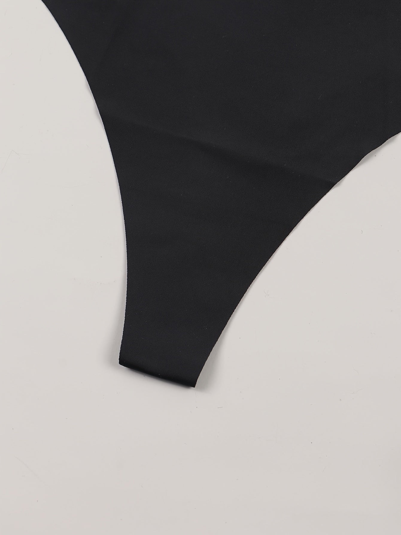 Solid black low waist thongs for women, sexy lingerie and underwear.