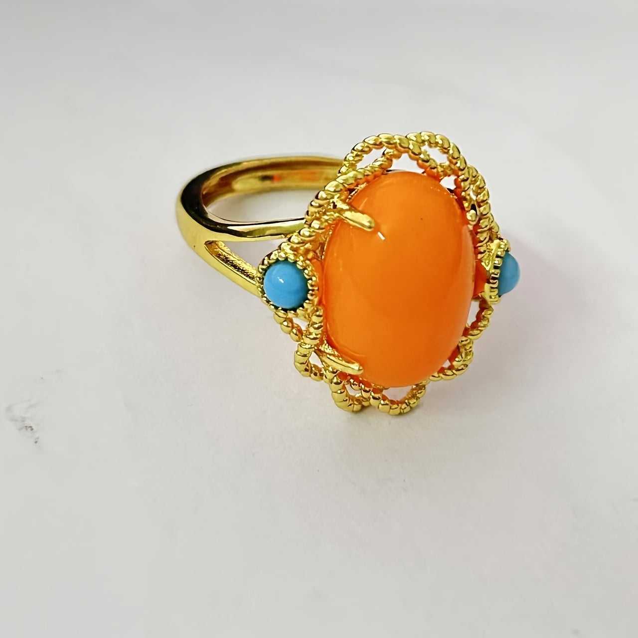 Vintage vacation style Claddagh ring featuring synthetic amber and turquoise stones, crafted with 18K golden plated 925 silver. The ring has an adjustable opening and is perfect for both daily wear and special occasions. This handcrafted personalized