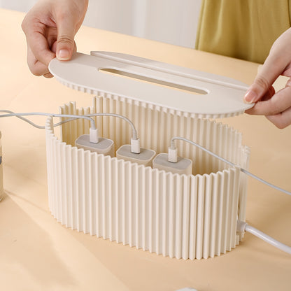 Stylish cord organizer box with lid to hide power strips and cables, ideal for desktop organization.