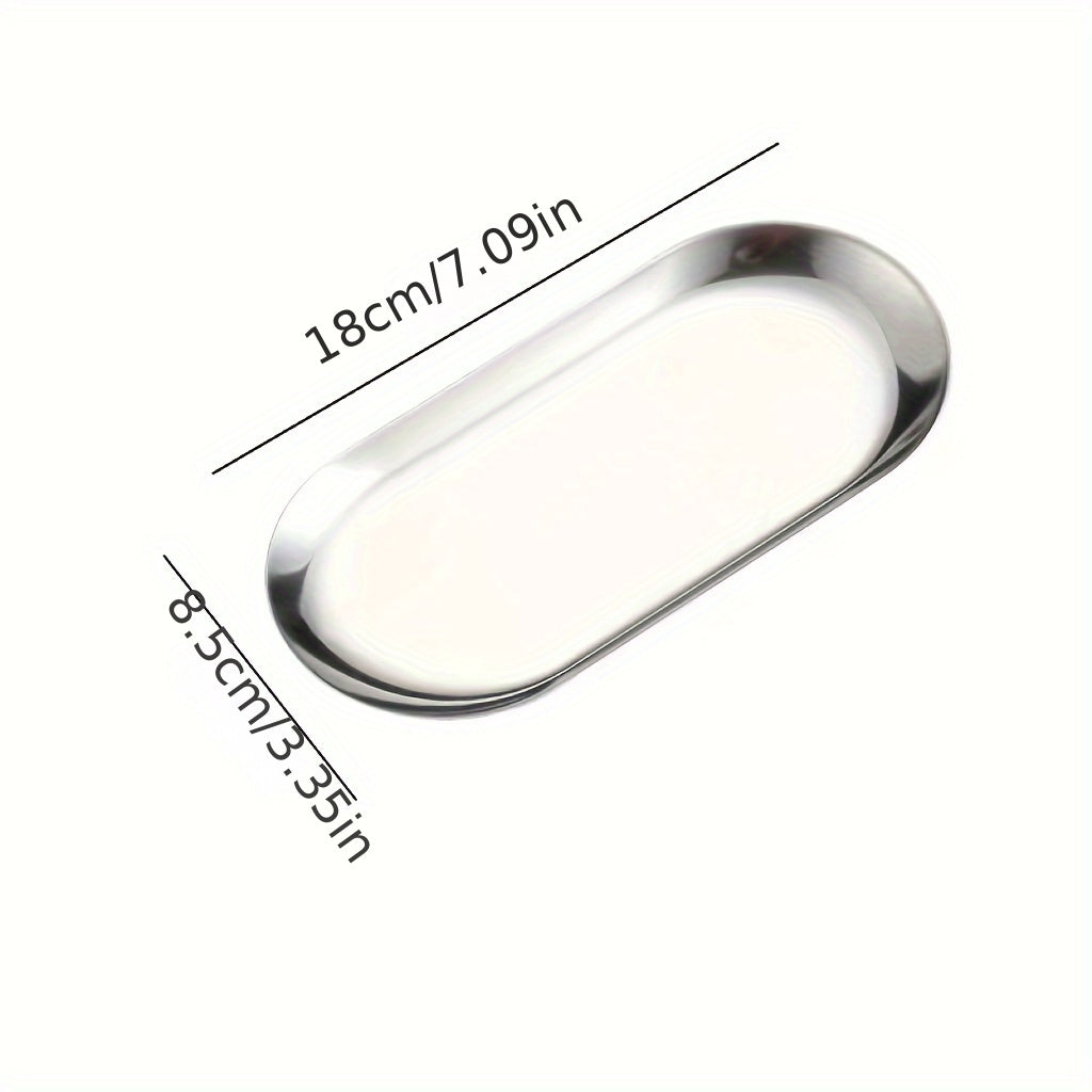 Stainless steel oval tray for jewelry, toiletries, or serving dim sum.