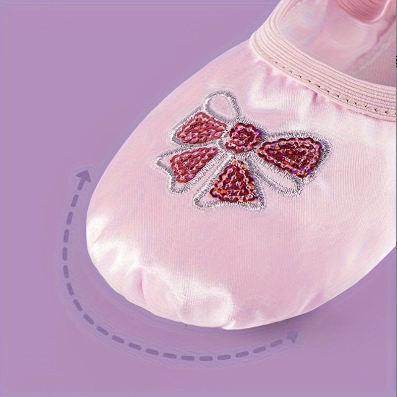 Girls’ ballet dance shoes with sparkling sequin and embroidered bow detail, soft sole, breathable canvas slip-ons. Available in pink and peach.