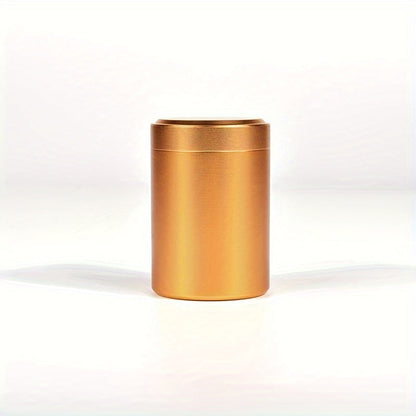 A compact stainless steel tea canister with sealed storage, ideal for on-the-go use. Packaged in a gift box, this household essential is perfect for storing tea on your travels.