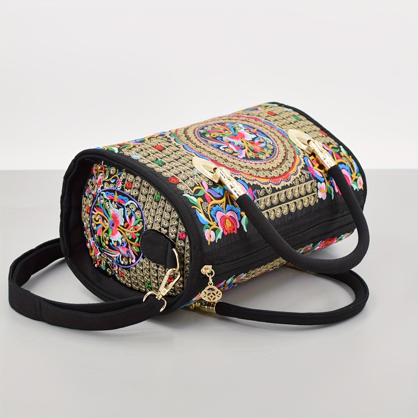 Vintage embroidered Boston bag with retro bohemian tote style for women.