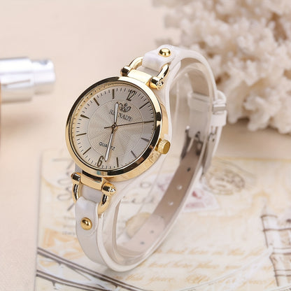 1 elegant women's quartz watch with black faux leather strap and golden-tone accents - fashionable analog display, battery operated, perfect for everyday and special occasions.