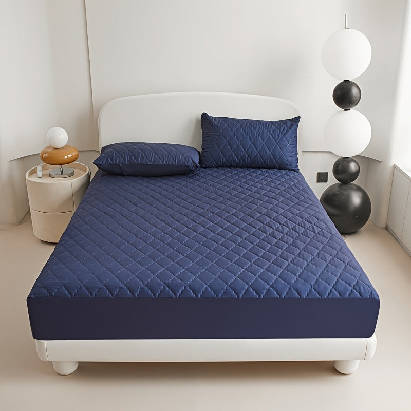 Diamond quilted waterproof bed sheet protector made of 100% woven polyester. Machine washable and available in multiple sizes (pillow shams not included).