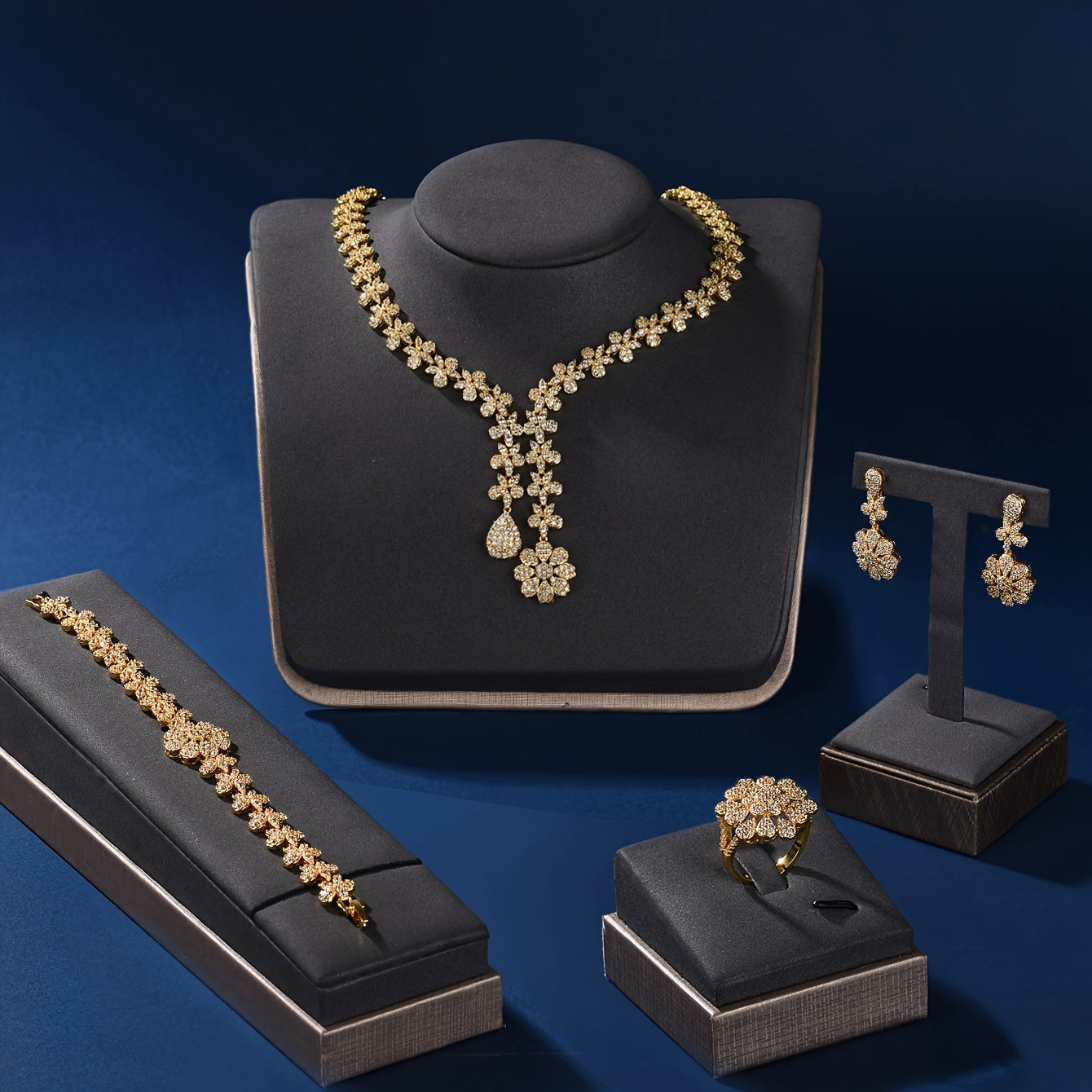 Luxurious 18K Gold Plated Copper Jewelry Set for Women featuring Synthetic Zirconia - Perfect for Parties and Holidays. This 5-Piece Set includes a Necklace, Bracelet, Earrings, and Ring, ideal for Weddings, Parties, and Thanksgiving celebrations.