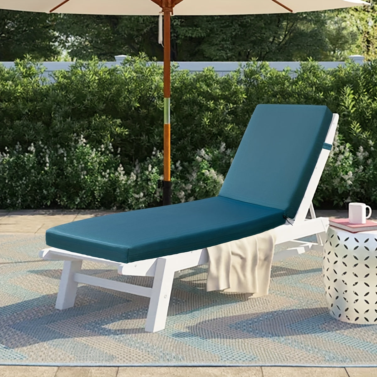 Outdoor chaise lounge cushion with foam fill, waterproof for outdoor use on patio, pool, or seaside.