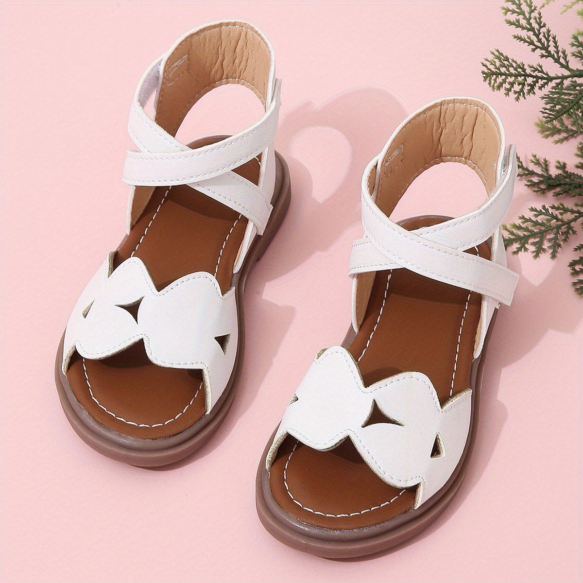 Girls' floral platform sandals with T-strap, block heel, and rubber sole - for ages 14 and under.