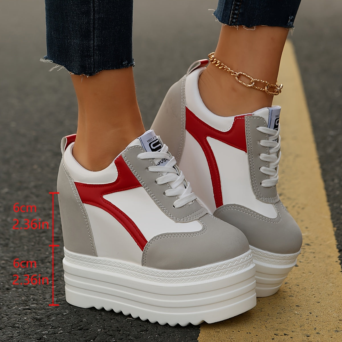 Women's platform sneakers with lace-up closure, fabric lining, lightweight construction, solid color, and low-top design for year-round wear.