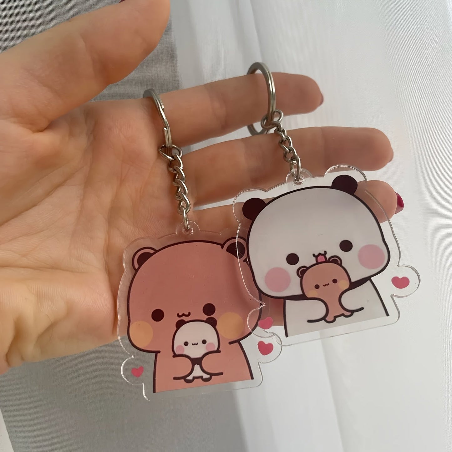 New fashion couple keychains featuring cartoon design made of acrylic material, perfect for accessorizing a cute school bag. This couple keychain set is a charming gift idea for student couples.