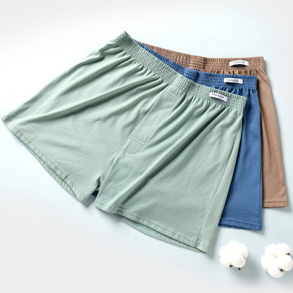 Men's cotton boxer pajama shorts, comfortable and breathable for summer wear. Suitable for home lounging, swim trunks, and casual wear.