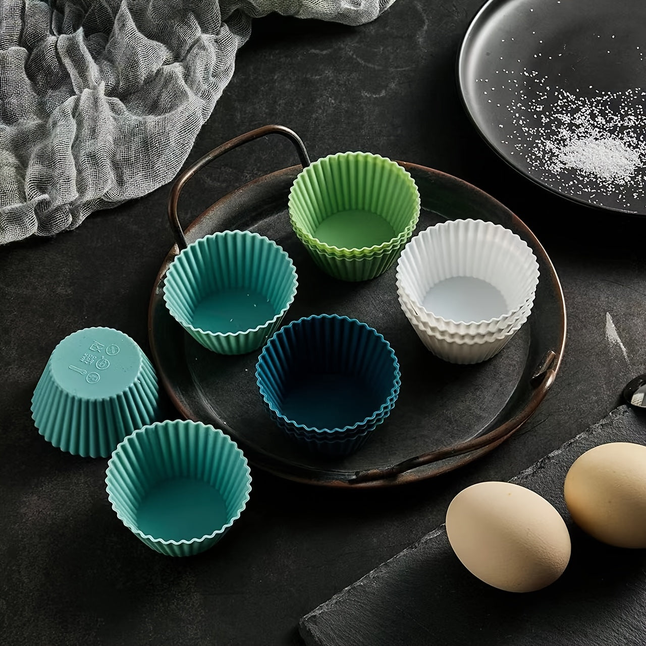 Morandi Color Round Silicone Muffin Cups available in a set of 12 or 24 pieces. This Mini Muffin & Cupcake Baking Pan also doubles as a Silicone Tart Mold, measuring 2.75" in diameter and 1.3" in height.