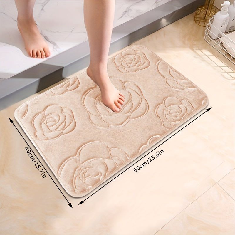 Soft and luxurious bath mat featuring a beautiful rose embossed design. This non-slip bathroom rug is made of ultra-soft knit polyester, providing superior comfort and absorbency. Lightweight and washable, this versatile mat is perfect for use in the