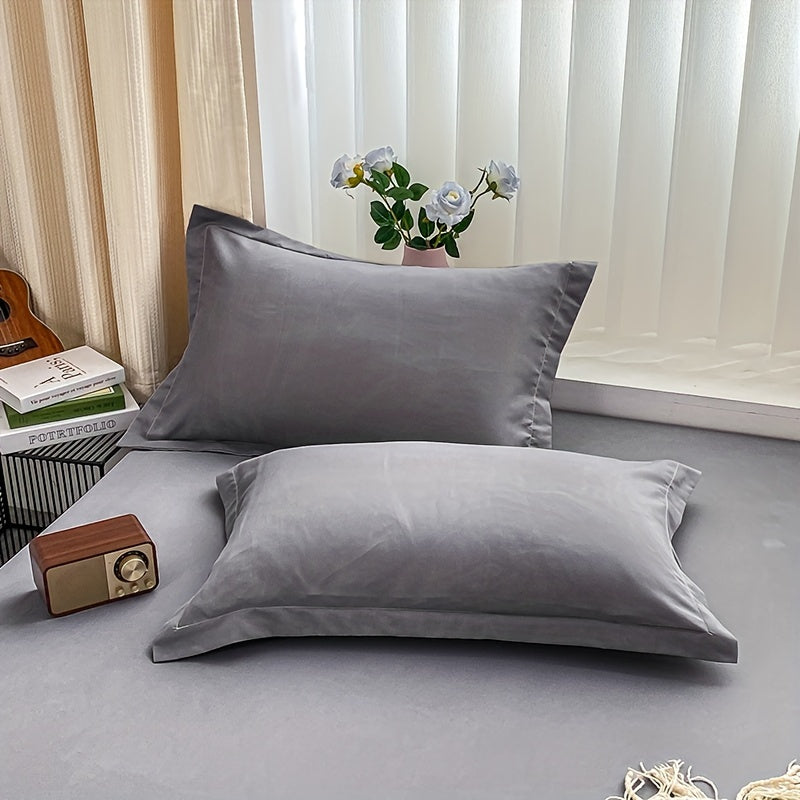 Soft and breathable bed sheet set includes 1 fitted sheet and 2 pillowcases, perfect for bedroom and guest room bedding. Easy to care for and suitable for all seasons.