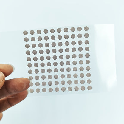 100 self-adhesive 4mm conductive tape dots for remote controls, keyboards, and game consoles. Easy repair patch for Xbox, PS4 controllers. No cutting required. Made from conductive silicone