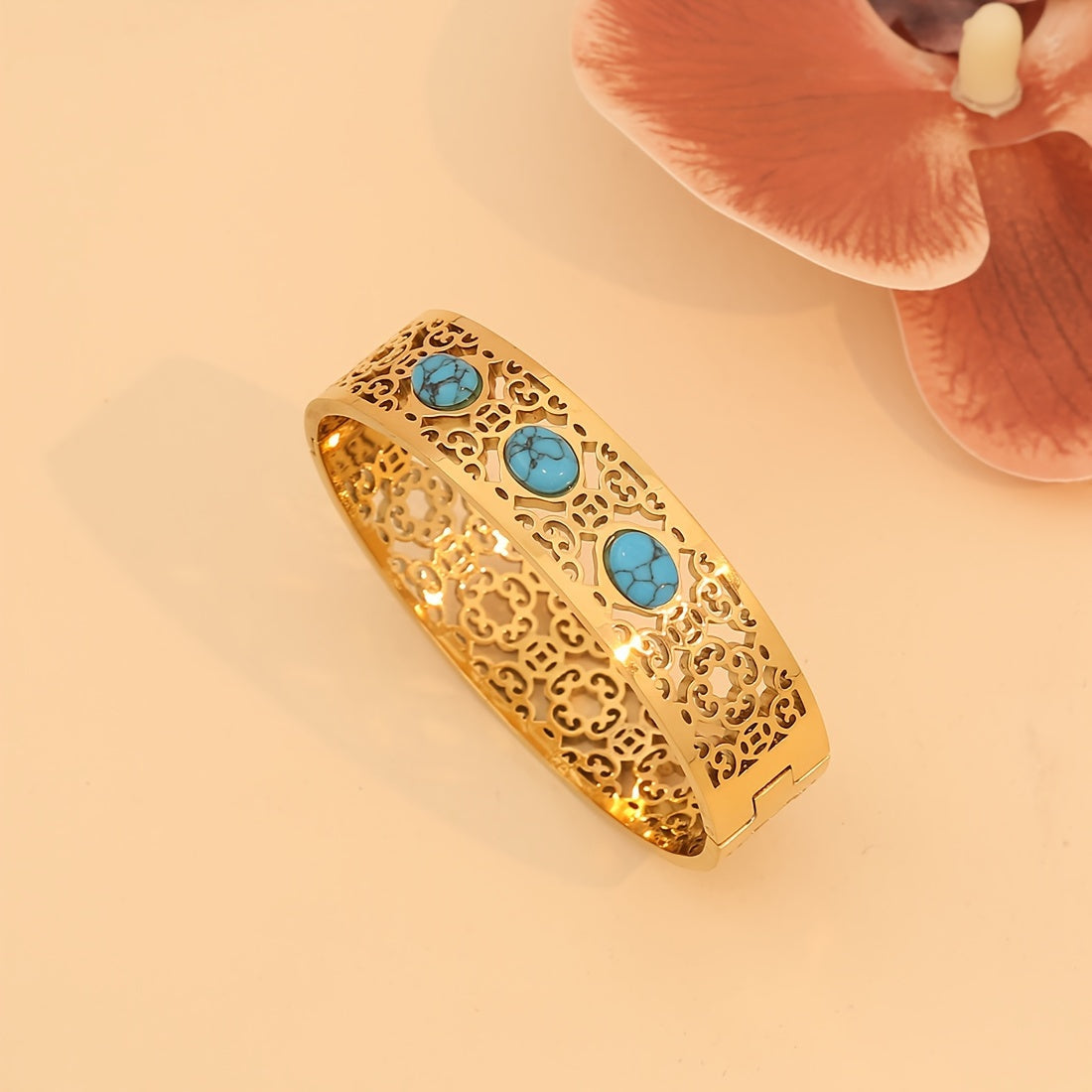 1pc of Vintage Style 18K Golden Plated Stainless Steel Bracelet featuring Turquoise Inlay and Hollow Pattern Design, specially designed for women as a Daily Wear Jewelry piece. This bracelet is the perfect Valentine's Day Gift.