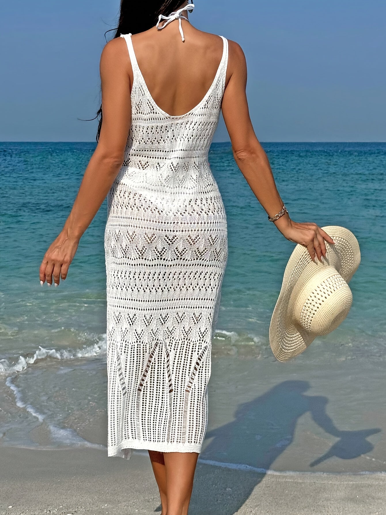 Women's white crochet maxi dress cover-up for beachwear, summer fashion.