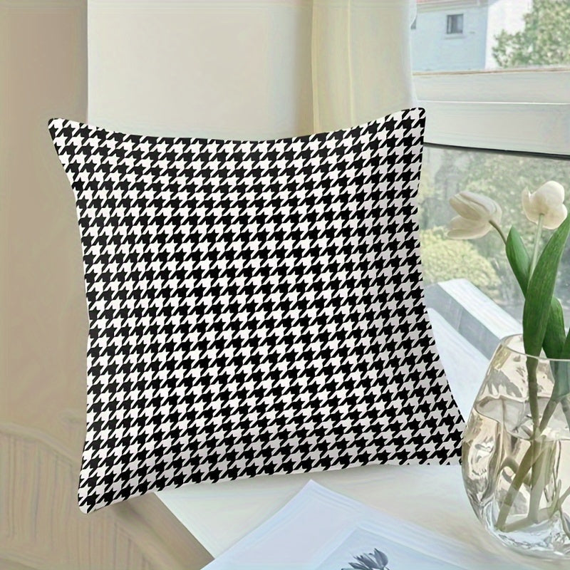 This stylish houndstooth throw pillow cover features a chic design, measuring 44.96cm square. The double-sided print is made of soft polyester and includes a convenient zip closure. Perfect for adding a touch of elegance to your living room or bedroom