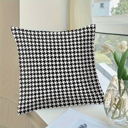 This stylish houndstooth throw pillow cover features a chic design, measuring 44.96cm square. The double-sided print is made of soft polyester and includes a convenient zip closure. Perfect for adding a touch of elegance to your living room or bedroom