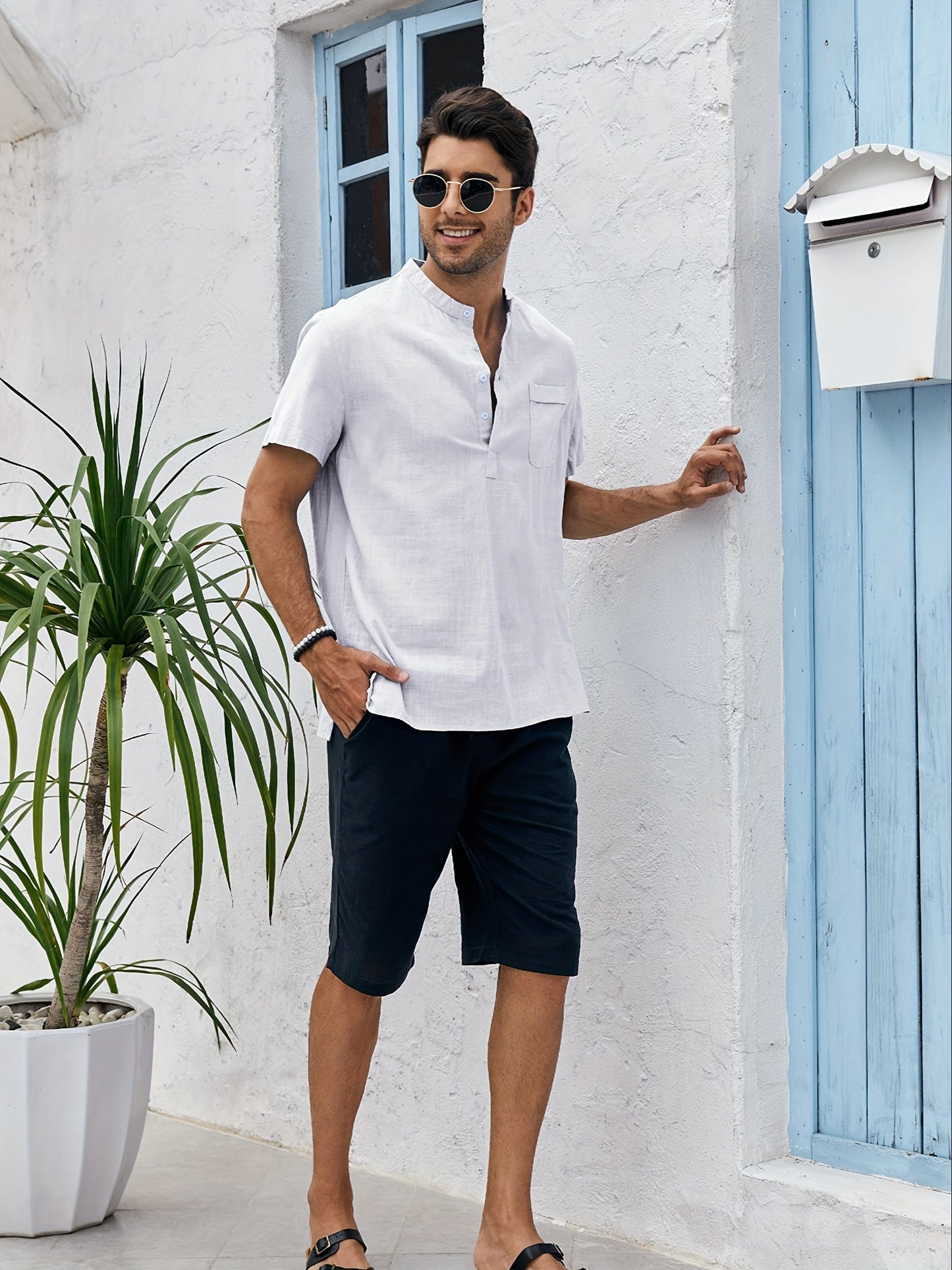 Men's loose fit cotton short sleeve shirt with stand collar and pocket, perfect for summer beach vacation.