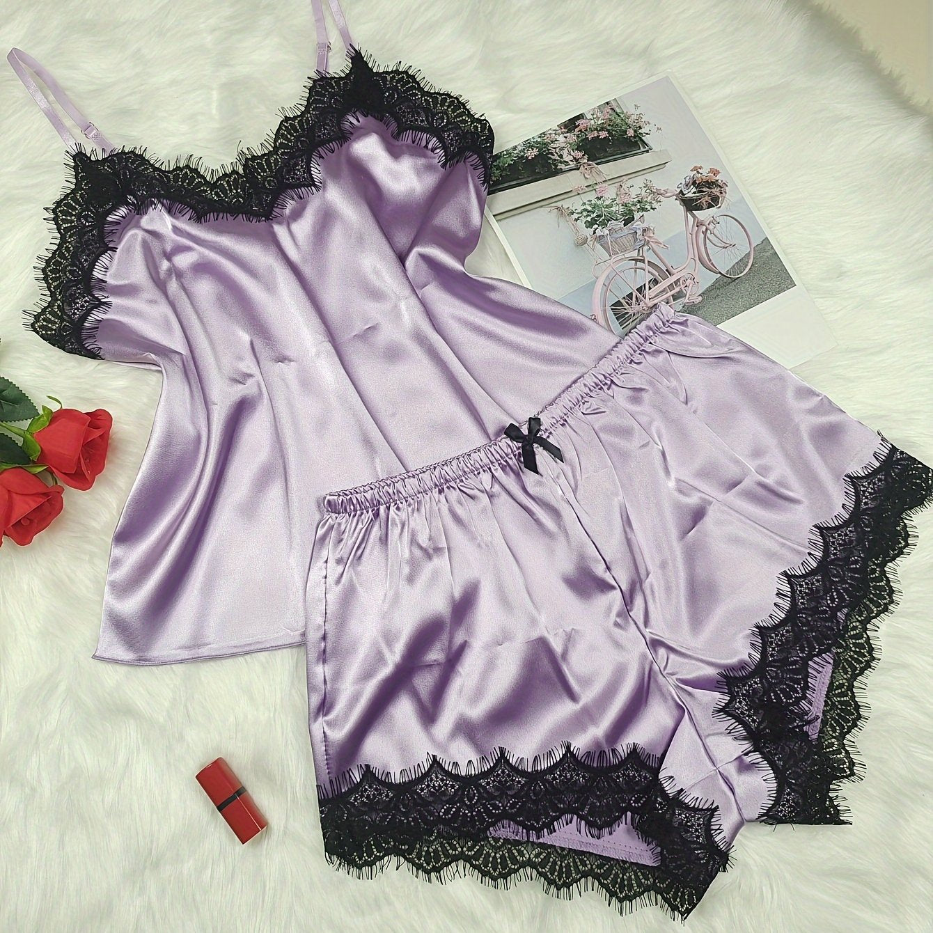 Women's sexy pajama set with V-neck, off-shoulder design, lace trim, and soft polyester blend for year-round comfort.