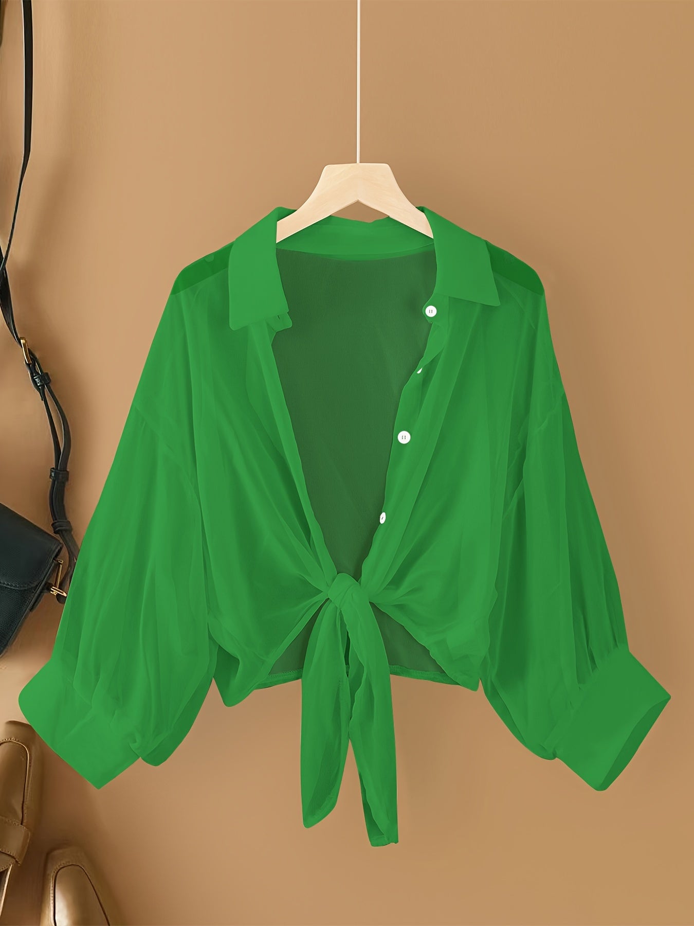 Women's casual chiffon cardigan with front bow detail and lapel collar, suitable for spring/summer/fall.