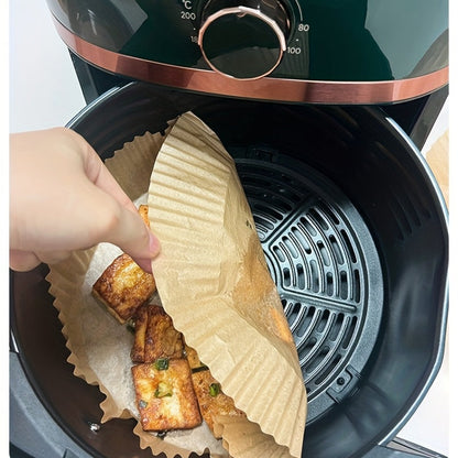 70 pieces of non-stick air fryer liners measuring 16.0cm, perfect for baking, cooking, and microwave use. These disposable paper bowls are oil and grease resistant, making them essential kitchen accessories.