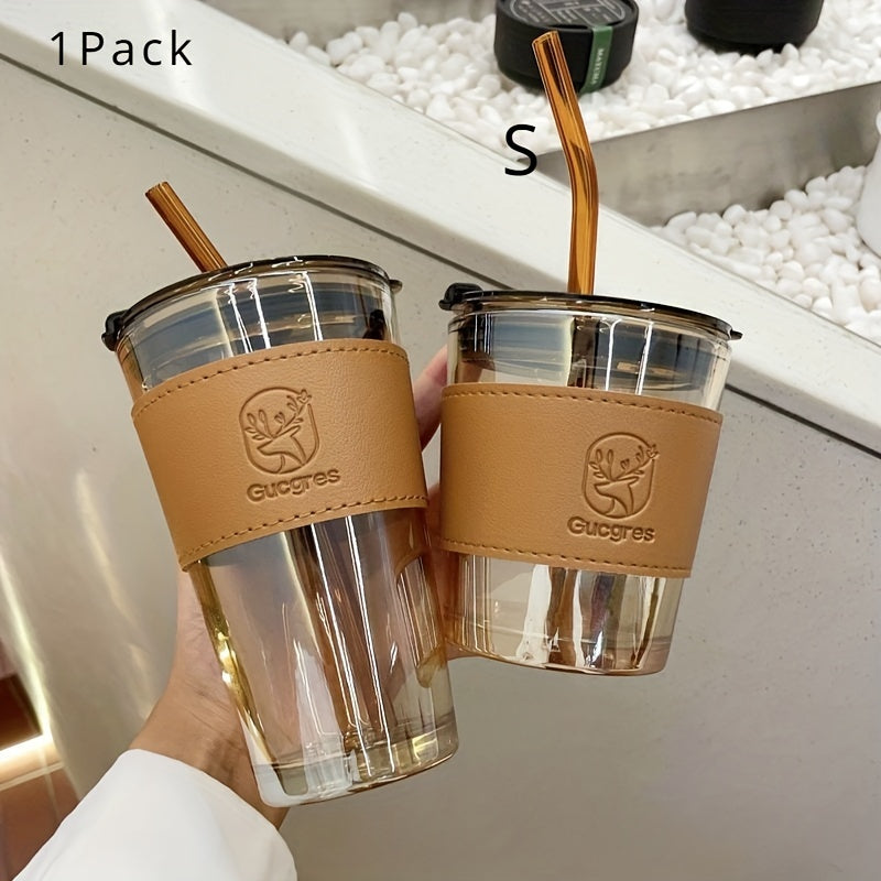 Stylish bamboo-inspired glass mug with straw, ideal for coffee and milk tea